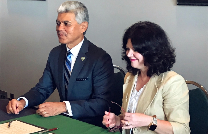 Wayne State University President Dr. M. Roy Wilson and St. Clair College President Patti France